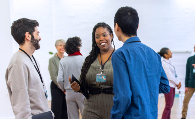 Three people talking in a circle